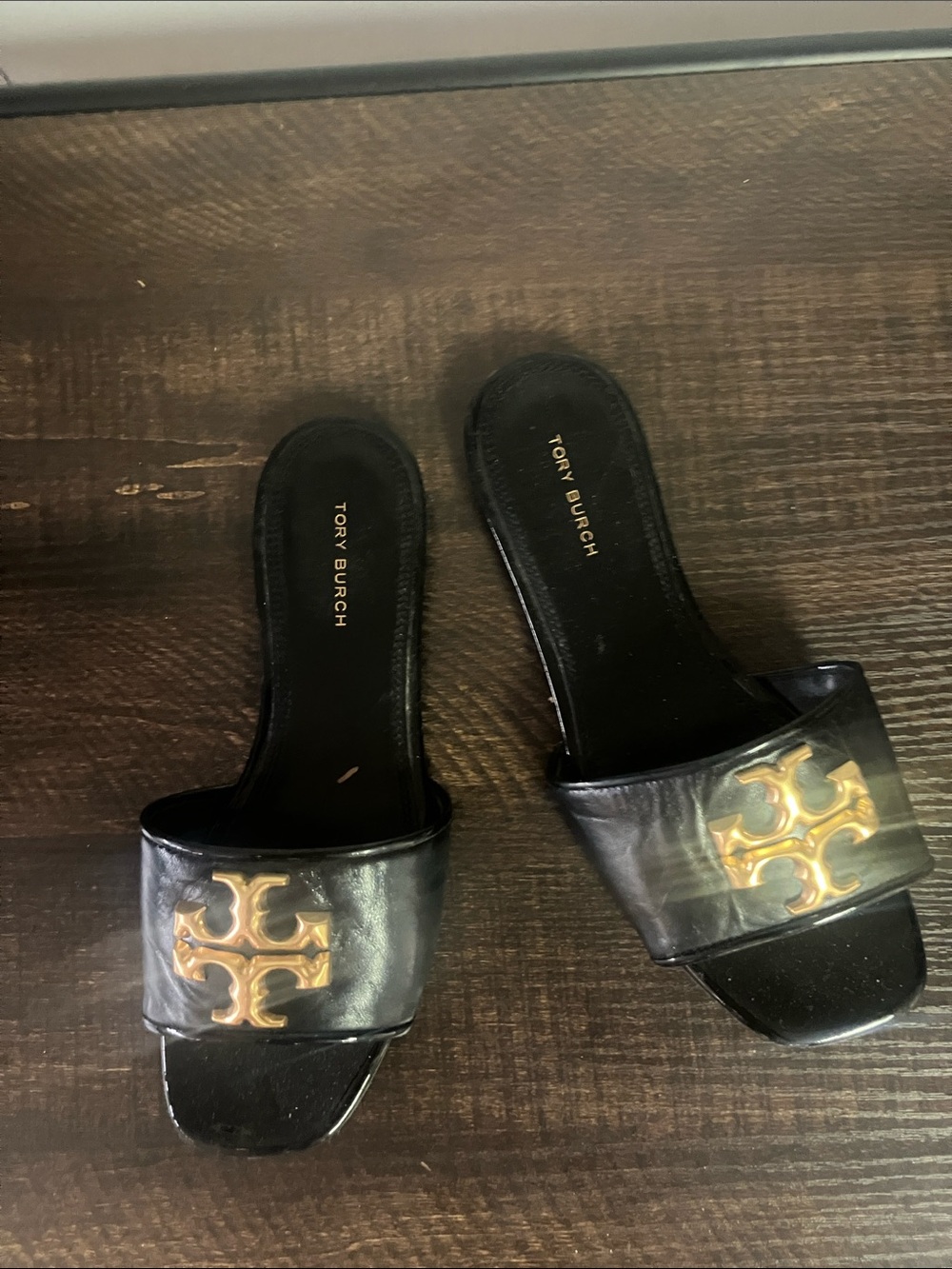 Tory Burch Black Leather Slide Mules with Gold Logo Emblem